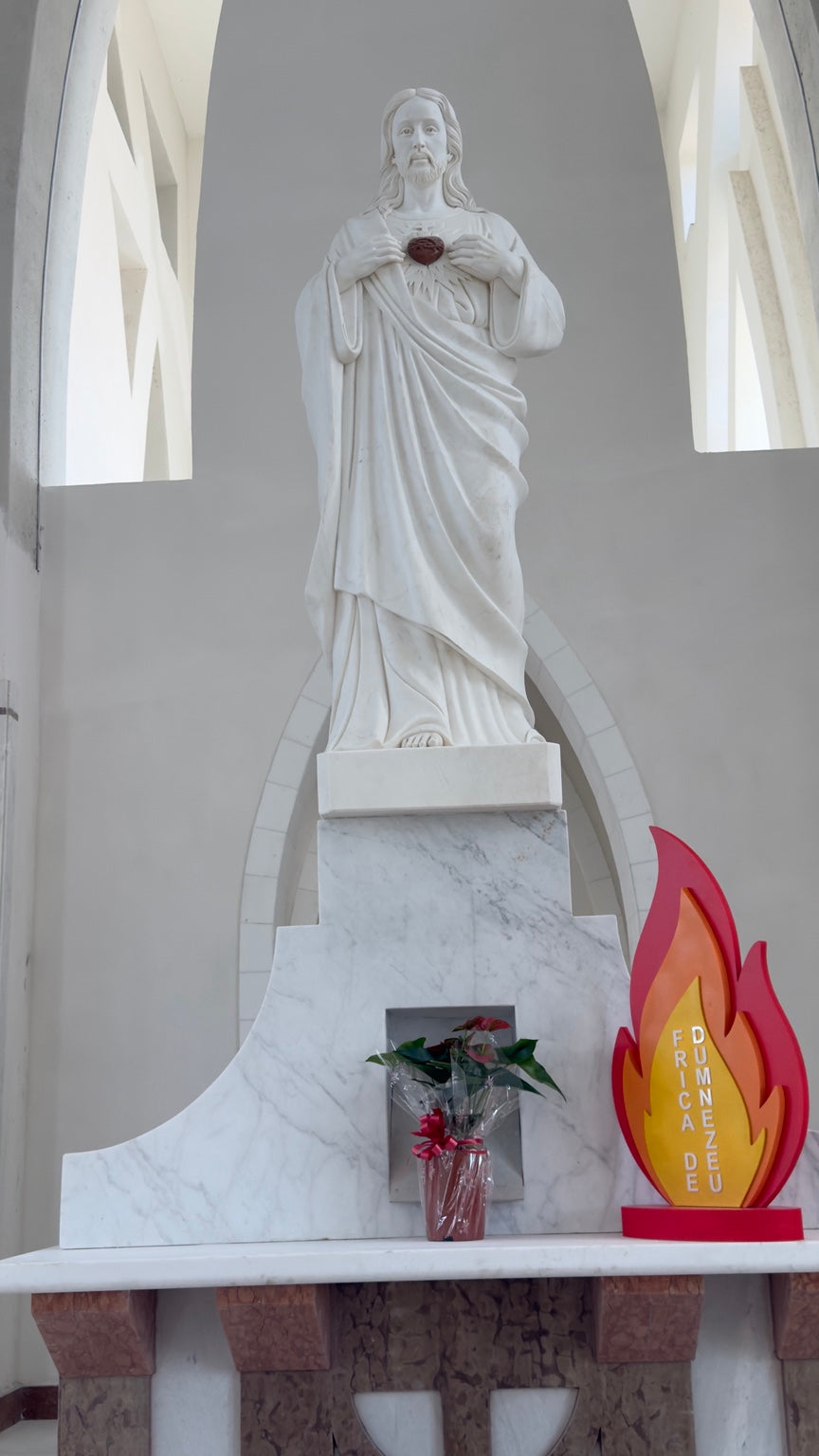 Sacred Heart of Jesus monumental marble statue installed in a sacred interior